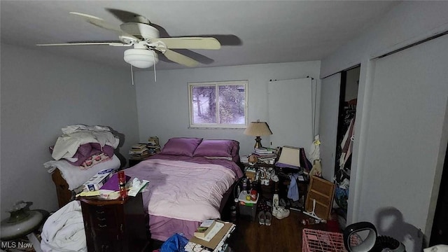 bedroom featuring ceiling fan and hardwood / wood-style floors