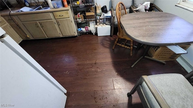 dining room featuring dark hardwood / wood-style flooring