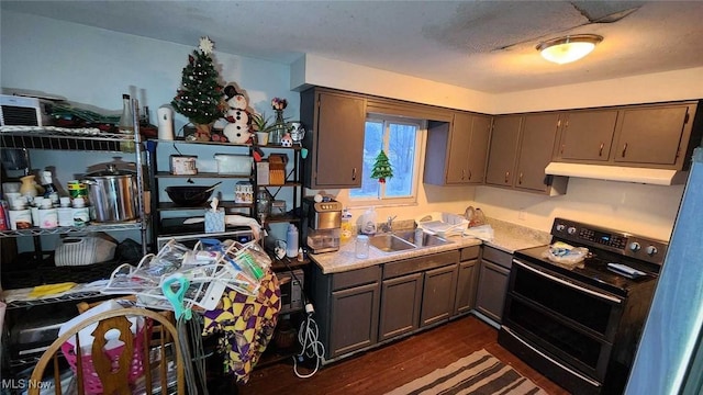 kitchen featuring sink, black electric range oven, and dark hardwood / wood-style floors