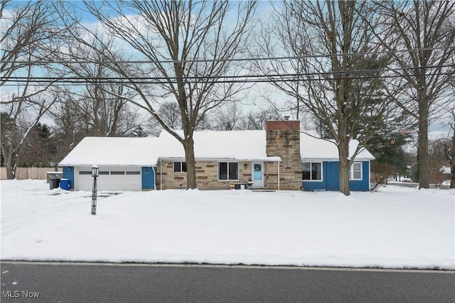 single story home with a garage