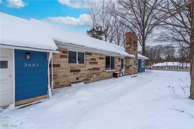 view of snow covered property