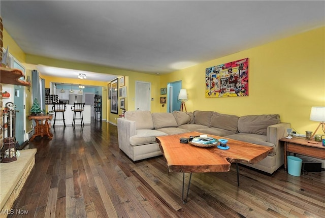 living room featuring dark hardwood / wood-style flooring