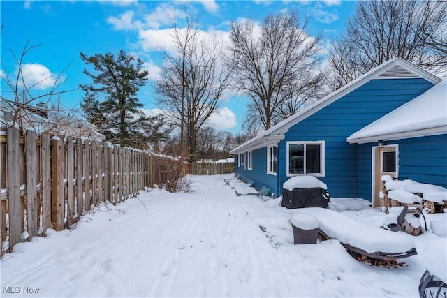 view of yard covered in snow