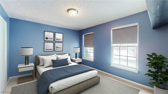 bedroom with carpet and a textured ceiling