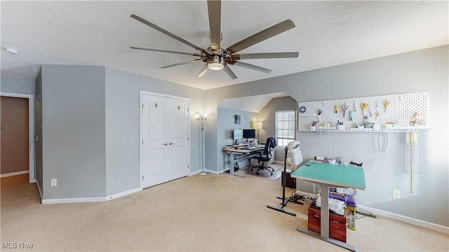 recreation room featuring carpet flooring, ceiling fan, a textured ceiling, and vaulted ceiling