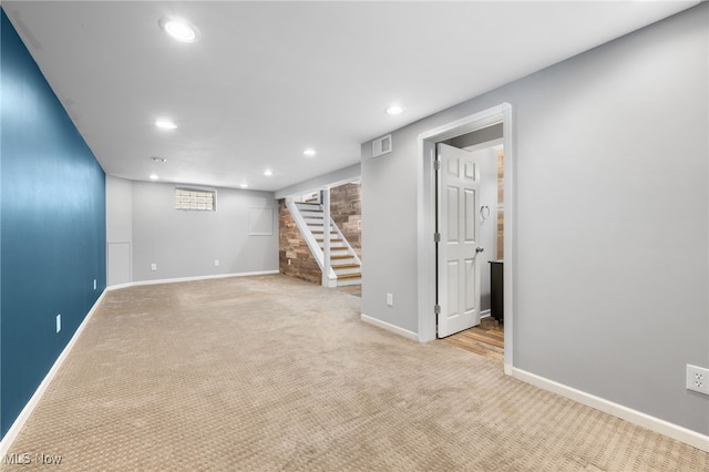 basement with light carpet