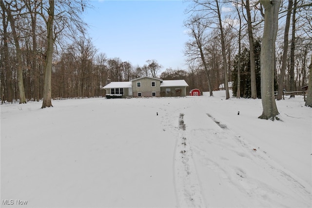 view of yard covered in snow