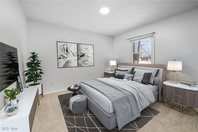 bedroom featuring dark carpet