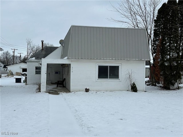 view of snow covered property