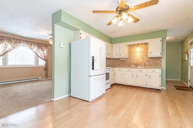 kitchen with white cabinets, white appliances, tasteful backsplash, and baseboard heating