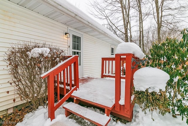 view of snow covered deck