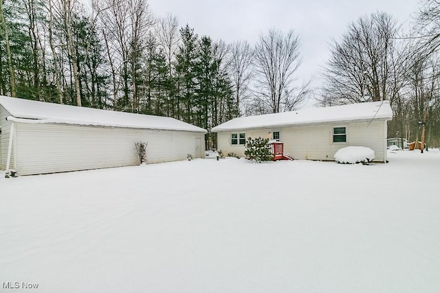 view of snow covered house