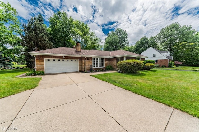 single story home with a garage and a front yard