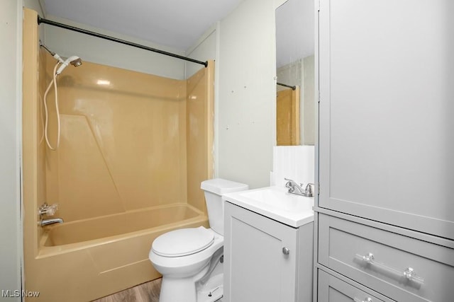 full bathroom with shower / bathing tub combination, vanity, toilet, and wood-type flooring