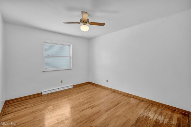 unfurnished room with ceiling fan, light hardwood / wood-style floors, and a baseboard radiator