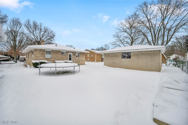 view of snow covered property