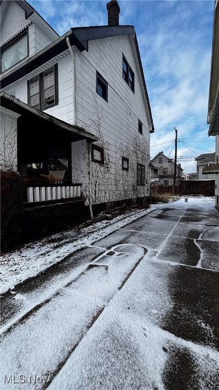 view of snow covered property