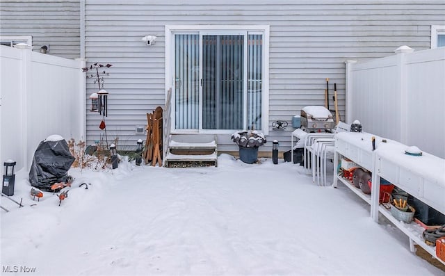 view of snow covered patio