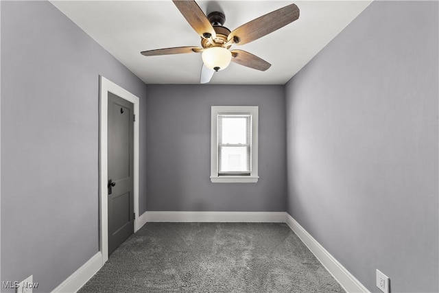 carpeted empty room with ceiling fan