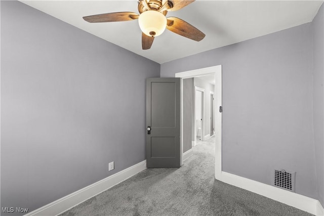 unfurnished room with ceiling fan