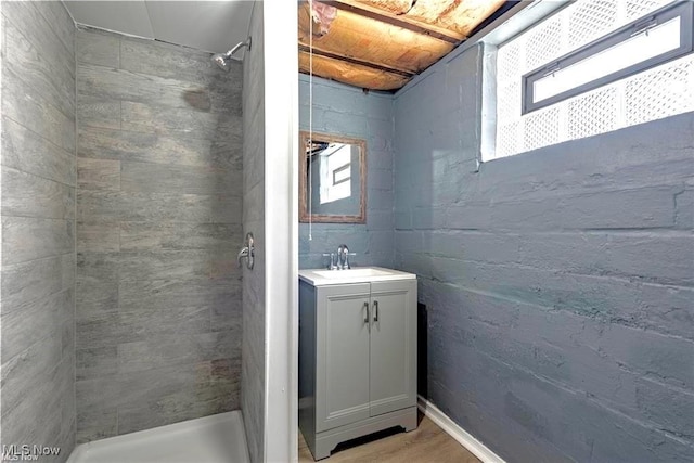 bathroom with vanity and walk in shower