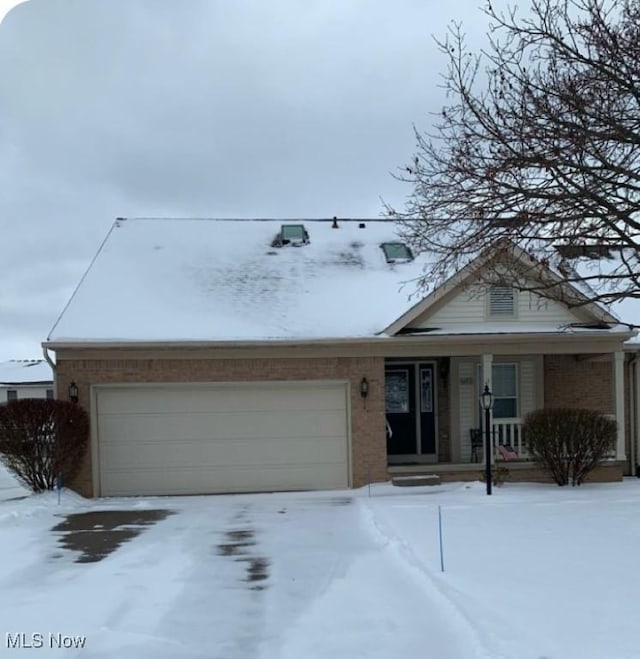 single story home with a garage