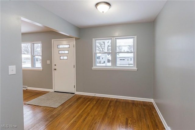 foyer with hardwood / wood-style flooring