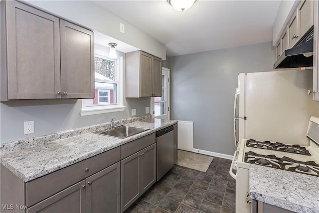 kitchen featuring white appliances and sink