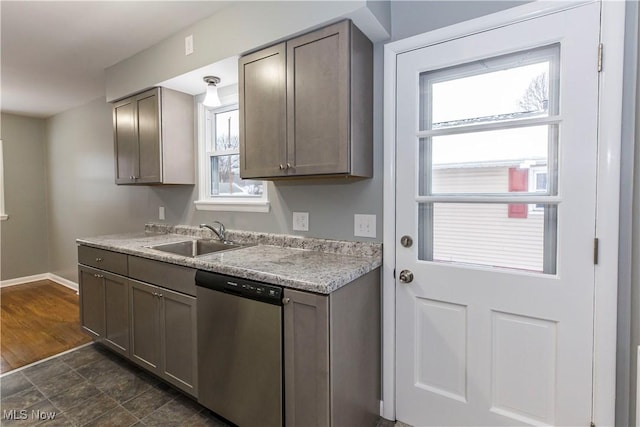 kitchen with dishwasher and sink