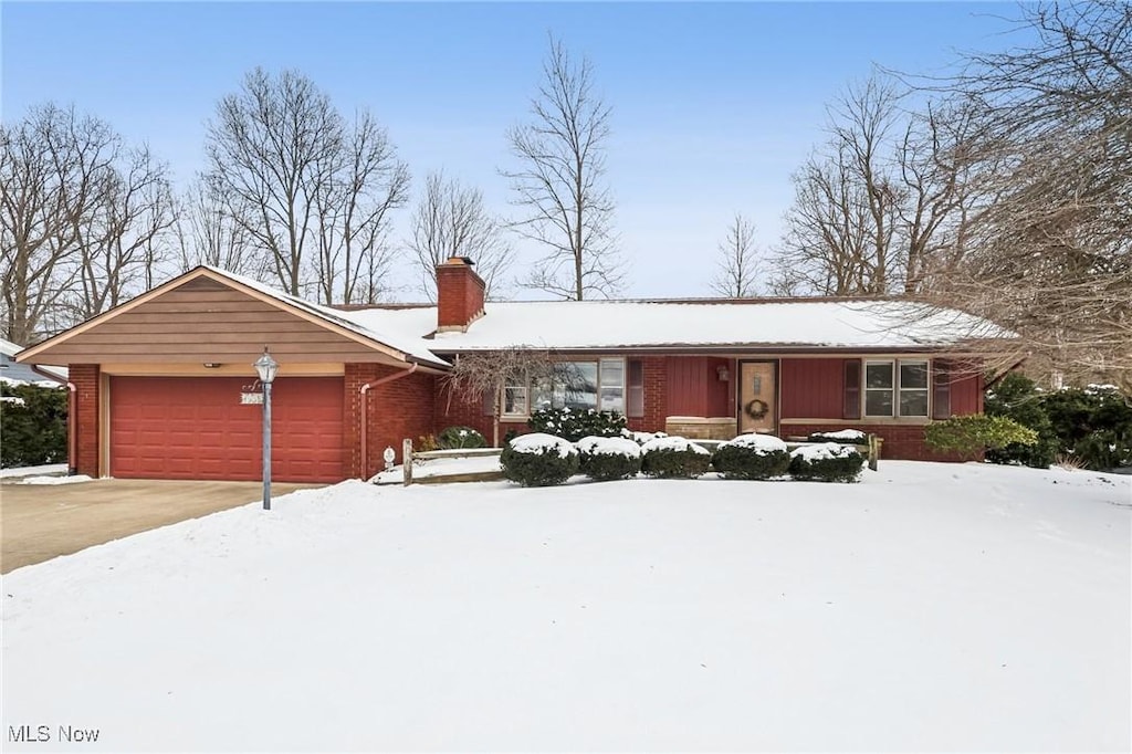 single story home with a garage