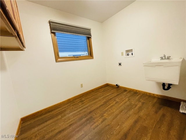 clothes washing area featuring electric dryer hookup, dark wood-type flooring, washer hookup, and sink