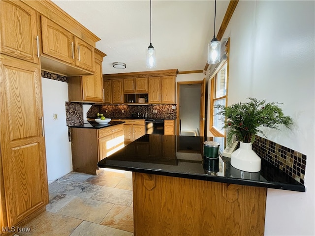 kitchen featuring backsplash, crown molding, hanging light fixtures, black dishwasher, and kitchen peninsula