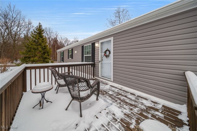 view of snow covered deck