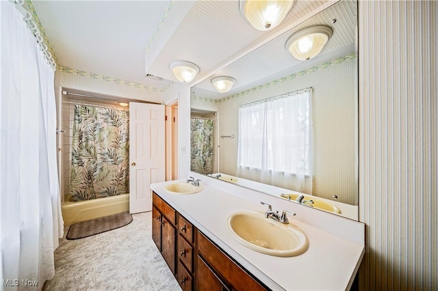 bathroom featuring vanity and curtained shower