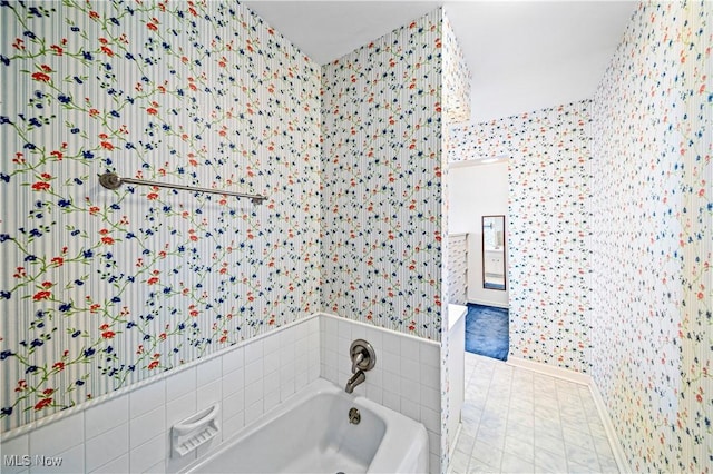 bathroom featuring a tub to relax in