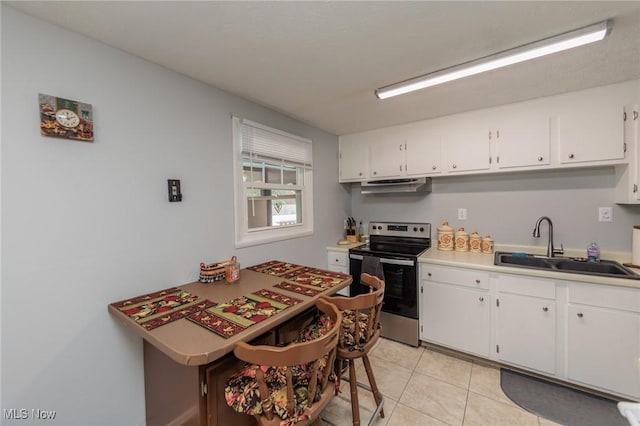 kitchen featuring white cabinetry, stainless steel electric stove, and sink