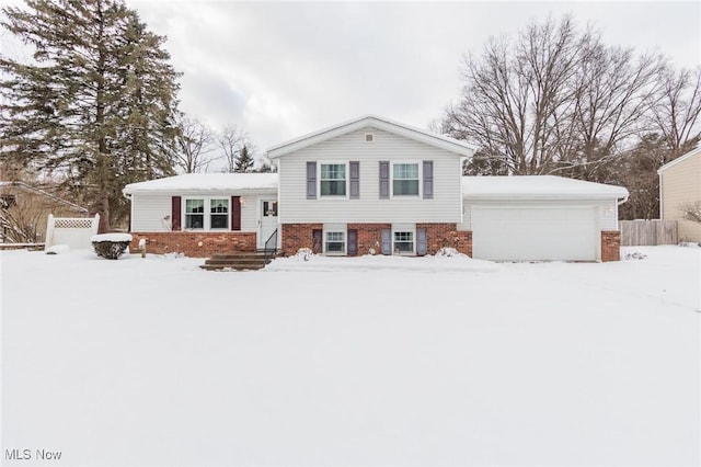 split level home featuring a garage