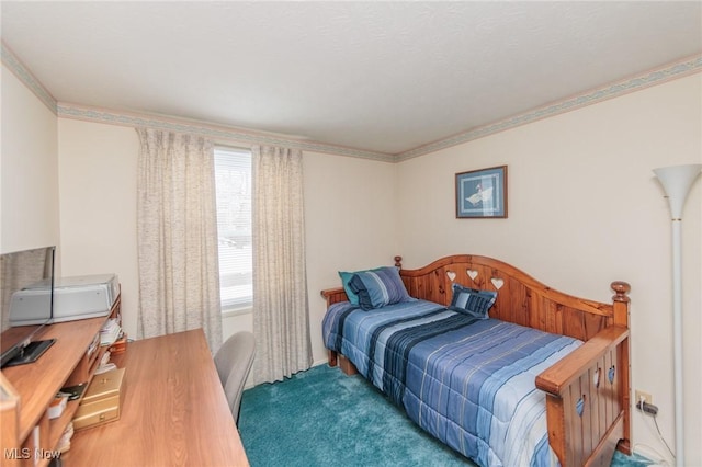 carpeted bedroom with ornamental molding