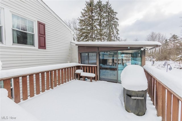 view of snow covered deck