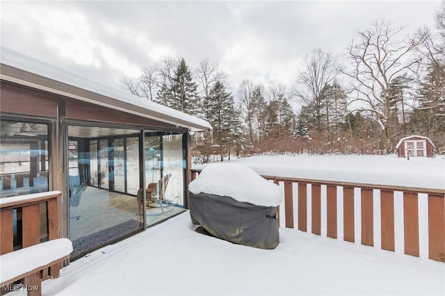 view of snow covered deck