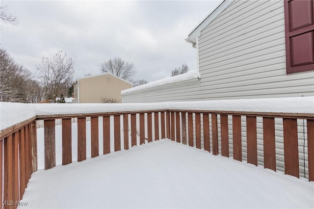 view of snow covered deck