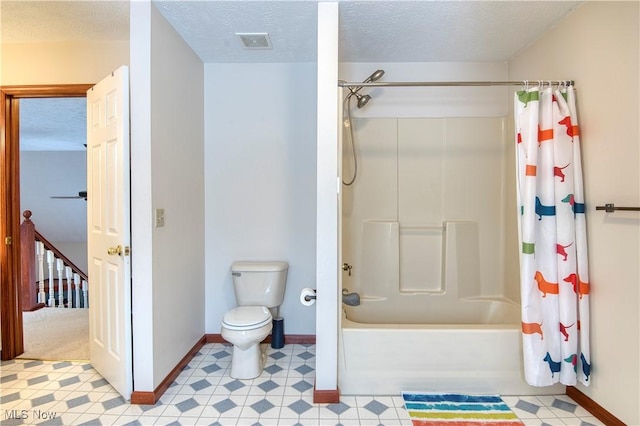 bathroom with shower / tub combo, a textured ceiling, and toilet