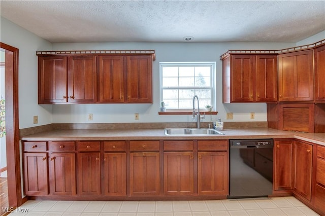 kitchen with dishwasher, a textured ceiling, and sink