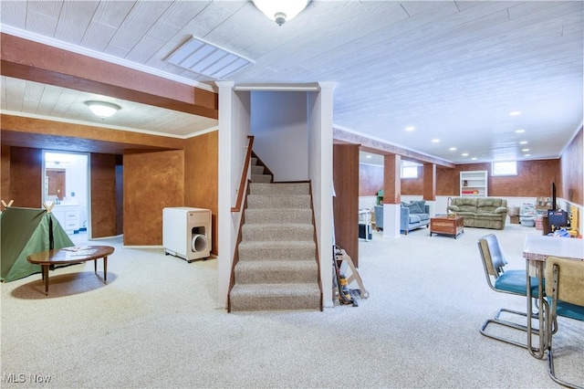 interior space featuring carpet and ornamental molding