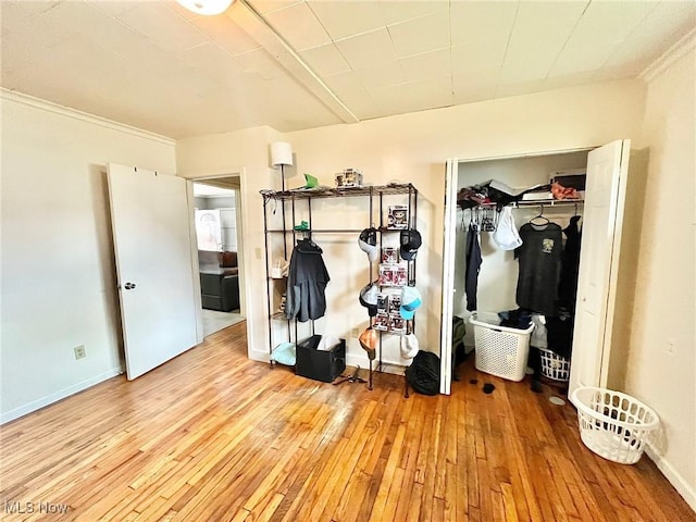 mudroom with light hardwood / wood-style floors