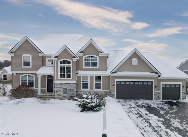 view of front of property with a garage