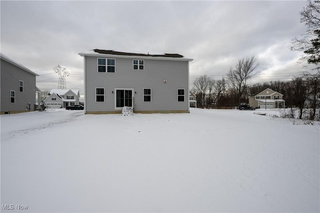 view of snow covered house