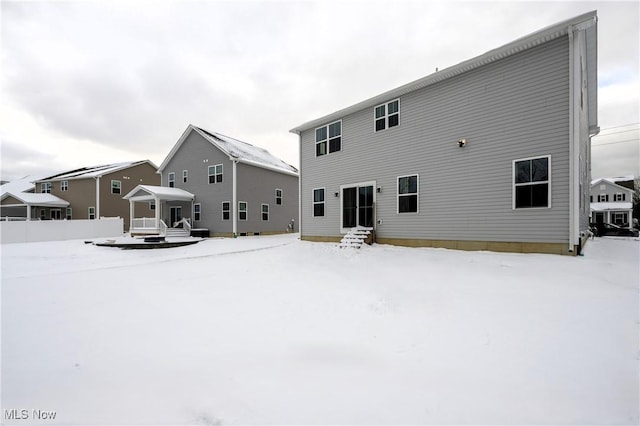 view of snow covered property