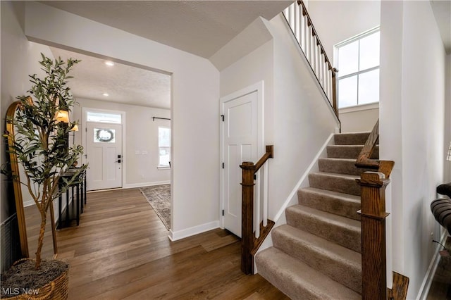 foyer featuring dark hardwood / wood-style floors