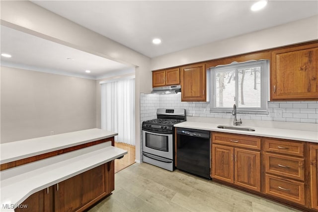 kitchen with dishwasher, gas stove, sink, and tasteful backsplash